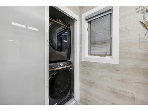 155 Scurfield Place Nw, Calgary, AB - Indoor Photo Showing Laundry Room