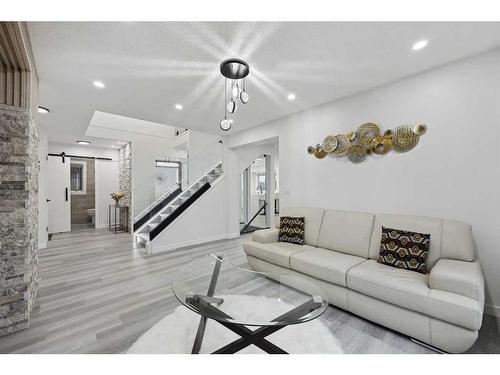 155 Scurfield Place Nw, Calgary, AB - Indoor Photo Showing Living Room