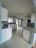 8140 47 Avenue Nw, Calgary, AB  - Indoor Photo Showing Kitchen 