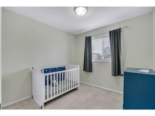 55 Coventry Road Ne, Calgary, AB - Indoor Photo Showing Bedroom