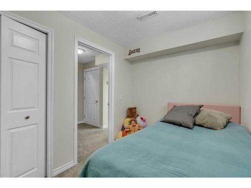 55 Coventry Road Ne, Calgary, AB - Indoor Photo Showing Bedroom