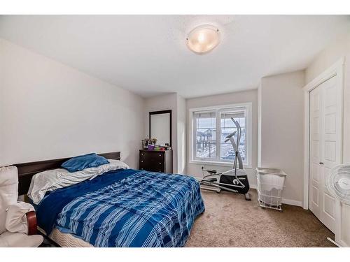 118 Red Embers Gate Ne, Calgary, AB - Indoor Photo Showing Bedroom