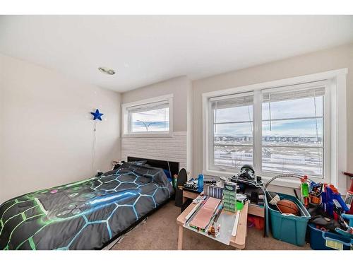 118 Red Embers Gate Ne, Calgary, AB - Indoor Photo Showing Bedroom