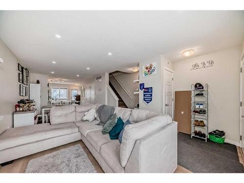 118 Red Embers Gate Ne, Calgary, AB - Indoor Photo Showing Living Room