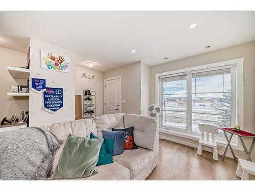 118 Red Embers Gate Ne, Calgary, AB - Indoor Photo Showing Living Room