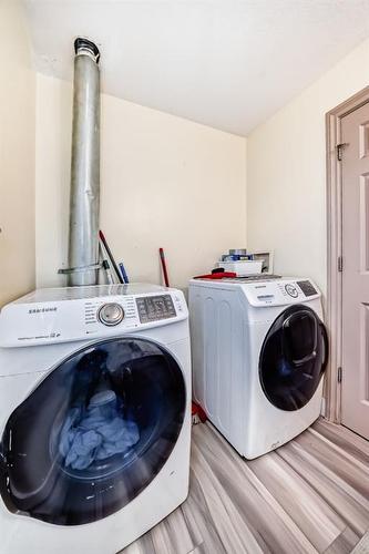 9 Dover Mews Se, Calgary, AB - Indoor Photo Showing Laundry Room