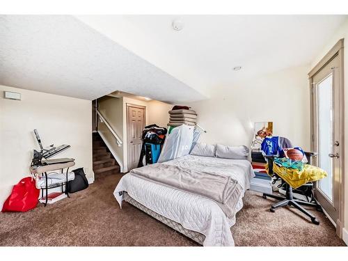 9 Dover Mews Se, Calgary, AB - Indoor Photo Showing Bedroom