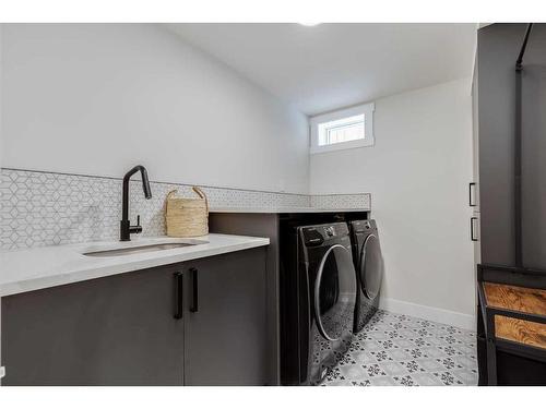 119 Silver Brook Road Nw, Calgary, AB - Indoor Photo Showing Laundry Room