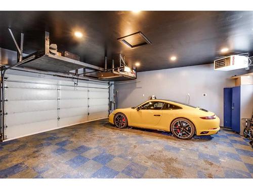 119 Silver Brook Road Nw, Calgary, AB - Indoor Photo Showing Garage