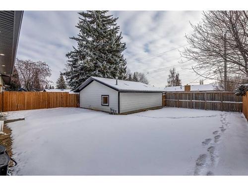 119 Silver Brook Road Nw, Calgary, AB - Indoor Photo Showing Garage