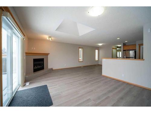 14 Taralea Bay Ne, Calgary, AB - Indoor Photo Showing Living Room With Fireplace