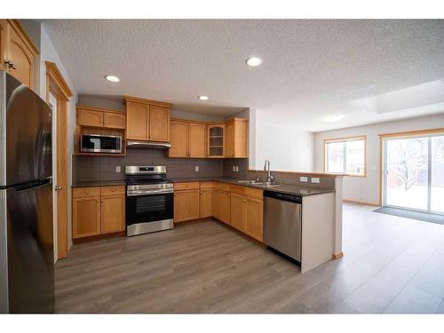 14 Taralea Bay Ne, Calgary, AB - Indoor Photo Showing Kitchen With Stainless Steel Kitchen With Double Sink