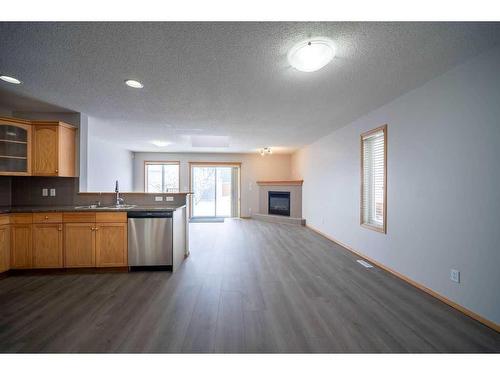 14 Taralea Bay Ne, Calgary, AB - Indoor With Fireplace