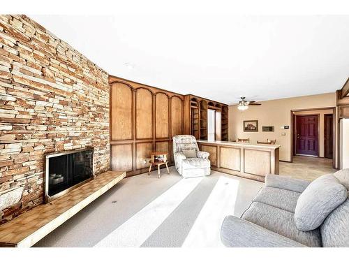 104 Hawkwood Crescent Nw, Calgary, AB -  Photo Showing Living Room With Fireplace