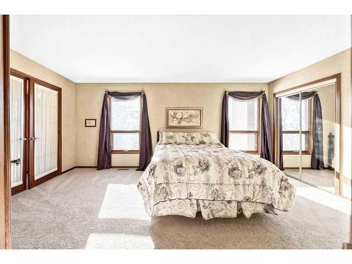 104 Hawkwood Crescent Nw, Calgary, AB - Indoor Photo Showing Bedroom