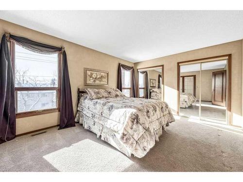 104 Hawkwood Crescent Nw, Calgary, AB - Indoor Photo Showing Bedroom