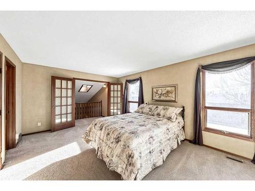 104 Hawkwood Crescent Nw, Calgary, AB - Indoor Photo Showing Bedroom