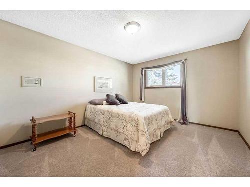 104 Hawkwood Crescent Nw, Calgary, AB - Indoor Photo Showing Bedroom