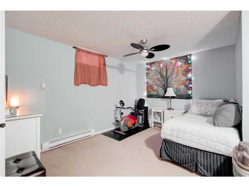 16 Ranchridge Crescent Nw, Calgary, AB - Indoor Photo Showing Bedroom