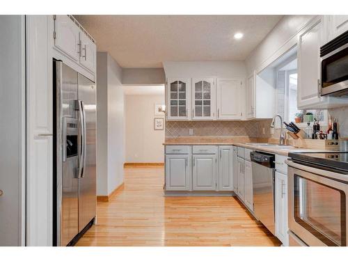 16 Ranchridge Crescent Nw, Calgary, AB - Indoor Photo Showing Kitchen With Stainless Steel Kitchen