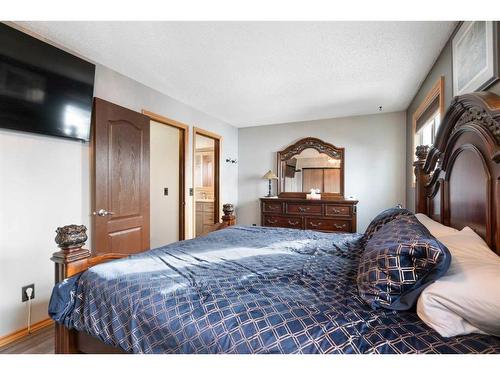 3 Rivervalley Place Se, Calgary, AB - Indoor Photo Showing Bedroom