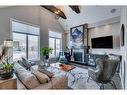 671 Cranston Avenue Se, Calgary, AB  - Indoor Photo Showing Living Room With Fireplace 