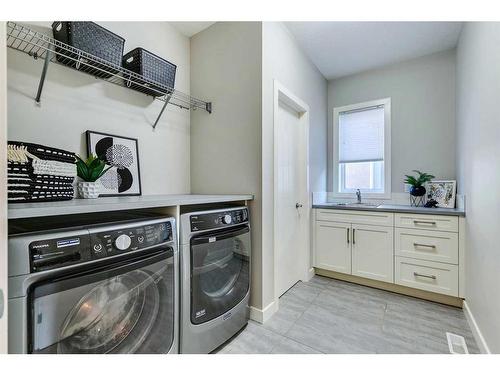 671 Cranston Avenue Se, Calgary, AB - Indoor Photo Showing Laundry Room