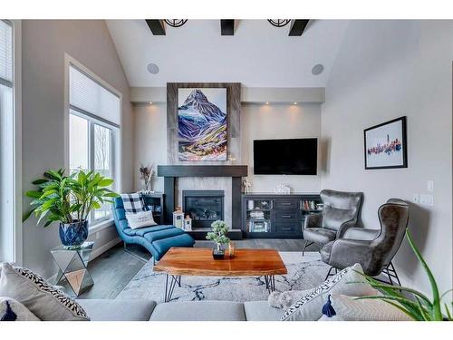 671 Cranston Avenue Se, Calgary, AB - Indoor Photo Showing Living Room With Fireplace