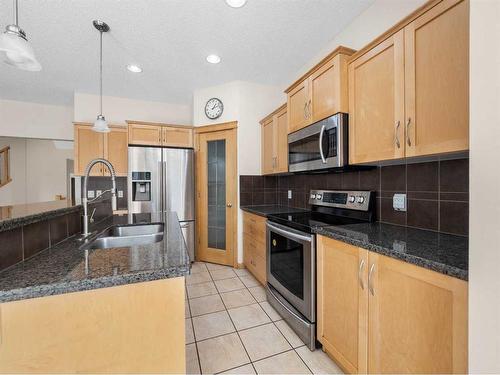 21 Cranwell Square Se, Calgary, AB - Indoor Photo Showing Kitchen With Stainless Steel Kitchen With Double Sink With Upgraded Kitchen