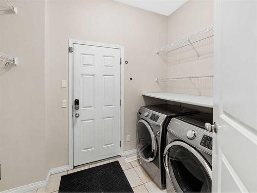 21 Cranwell Square Se, Calgary, AB - Indoor Photo Showing Laundry Room