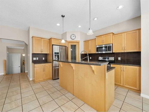 21 Cranwell Square Se, Calgary, AB - Indoor Photo Showing Kitchen With Stainless Steel Kitchen