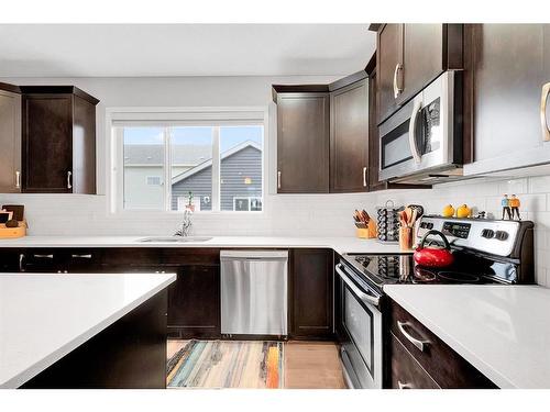 1701 Legacy Circle Se, Calgary, AB - Indoor Photo Showing Kitchen With Upgraded Kitchen