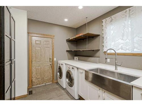 191 Rocky Ridge Landing Nw, Calgary, AB - Indoor Photo Showing Laundry Room