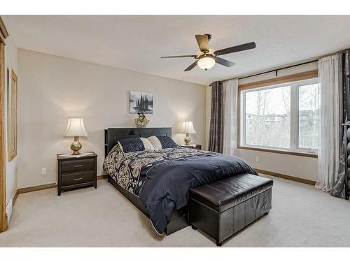 191 Rocky Ridge Landing Nw, Calgary, AB - Indoor Photo Showing Bedroom