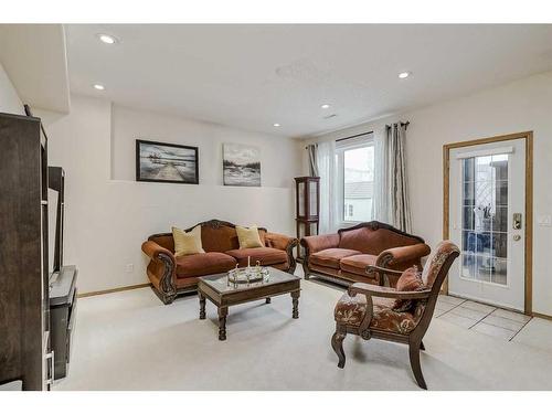 191 Rocky Ridge Landing Nw, Calgary, AB - Indoor Photo Showing Living Room