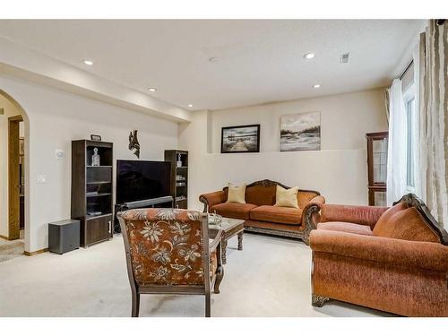 191 Rocky Ridge Landing Nw, Calgary, AB - Indoor Photo Showing Living Room