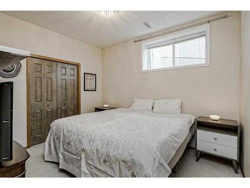 191 Rocky Ridge Landing Nw, Calgary, AB - Indoor Photo Showing Bedroom