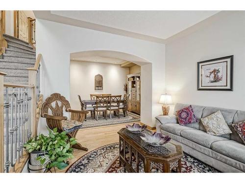 191 Rocky Ridge Landing Nw, Calgary, AB - Indoor Photo Showing Living Room