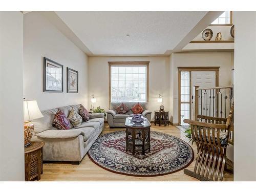 191 Rocky Ridge Landing Nw, Calgary, AB - Indoor Photo Showing Living Room