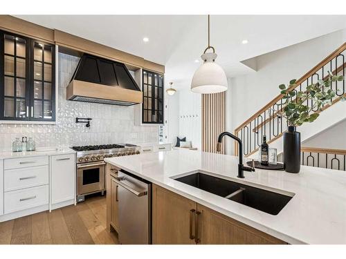 1618 Bowness Road Nw, Calgary, AB - Indoor Photo Showing Kitchen With Double Sink With Upgraded Kitchen