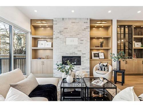 1618 Bowness Road Nw, Calgary, AB - Indoor Photo Showing Living Room With Fireplace