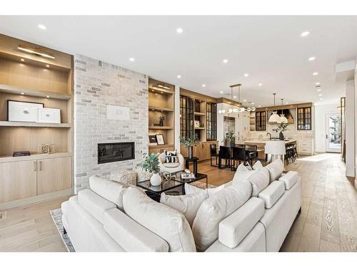 1618 Bowness Road Nw, Calgary, AB - Indoor Photo Showing Living Room With Fireplace