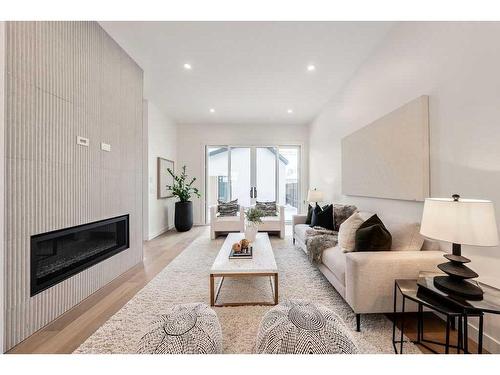 3115 13 Avenue Sw, Calgary, AB - Indoor Photo Showing Living Room With Fireplace