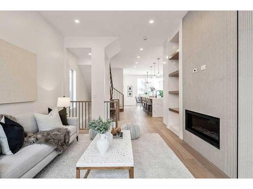 3115 13 Avenue Sw, Calgary, AB - Indoor Photo Showing Living Room With Fireplace