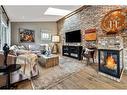 528 14 Avenue Ne, Calgary, AB  - Indoor Photo Showing Living Room With Fireplace 