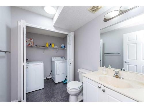 96 Taradale Drive Ne, Calgary, AB - Indoor Photo Showing Laundry Room