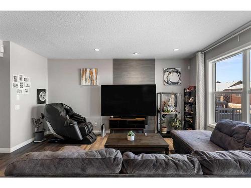 99 Evansfield Rise Nw, Calgary, AB - Indoor Photo Showing Living Room