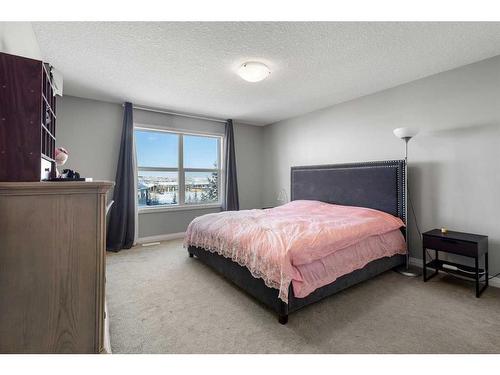 99 Evansfield Rise Nw, Calgary, AB - Indoor Photo Showing Bedroom