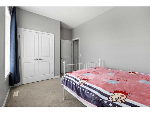 99 Evansfield Rise Nw, Calgary, AB - Indoor Photo Showing Bedroom