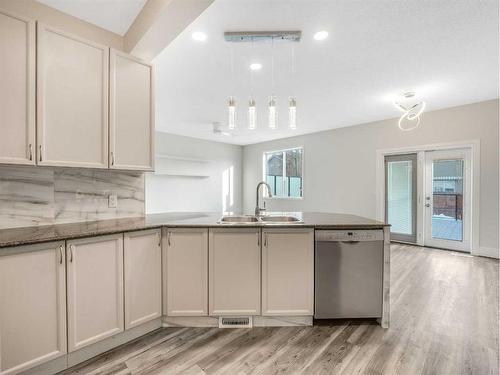 53 Chaparral Ridge Rise Se, Calgary, AB - Indoor Photo Showing Kitchen With Double Sink